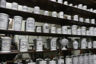 Pharmacy shelves stocked with medicines