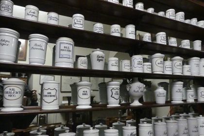 Pharmacy shelves stocked with medicines