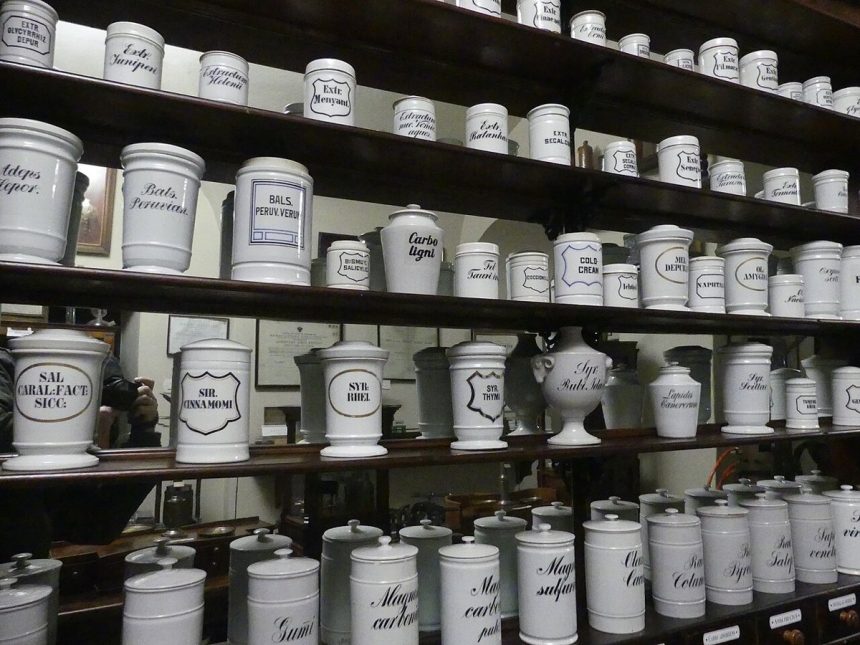 Pharmacy shelves stocked with medicines