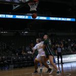 A women's basketball player in action during a game