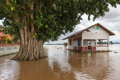 Homes on a flooded street after heavy rain