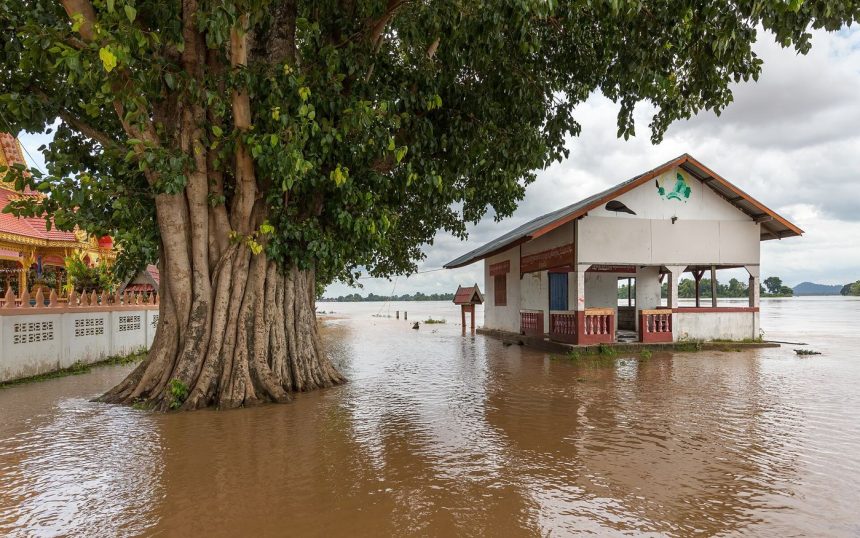 Homes on a flooded street after heavy rain