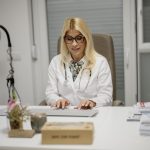 A doctor consulting with a patient